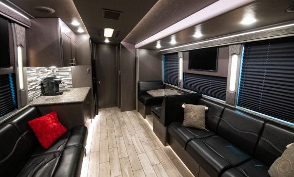 Entertainer tour bus front lounge