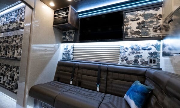 Tin Man tour bus back lounge